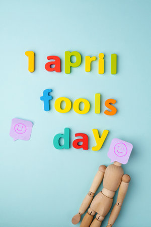 1 April fools day concept, blue background. flat lay. vertical photoの写真素材