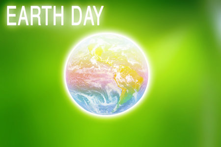 Earth is a planet against a blurry green background, the environment. Earth Day Concept. Elements of this image are furnished by NASAの写真素材