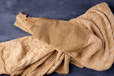 Old jacket made of camel hair. The concept of charity shops, resale, second hand.の写真素材