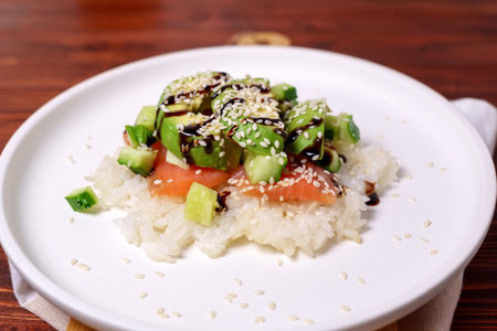 Sushi waffle is a recipe that has become quite popular. Home cooking, salmon, cucumber, avocado, sesame and sauceの写真素材