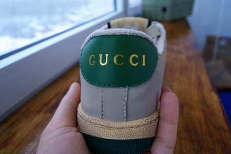Tyumen, Russia-February 23, 2023: Gucci sneakers logo close-up. Stylish, fashionable. Fashion conceptのeditorial素材
