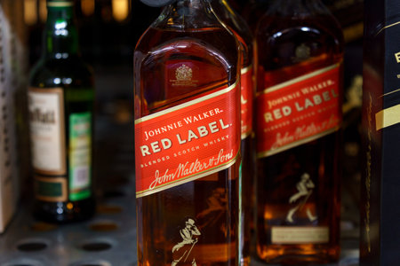 Tyumen, Russia-March 17, 2023: Johnnie Walker is the most widely distributed brand of blended Scotch whiskyのeditorial素材