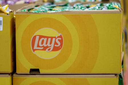 Tyumen, Russia-May 05, 2023: Packets of Lays logo potato chips, popular American brandのeditorial素材