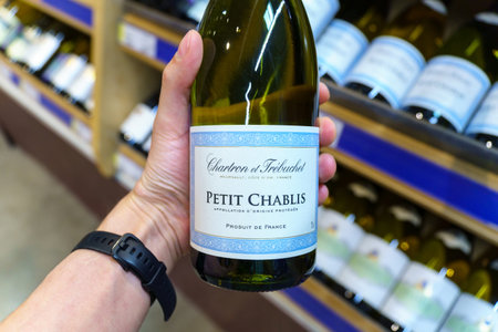 Tyumen, Russia-May 05, 2023: Petit Chablis is created from selected Chardonnay grapes grown on a plateau overlooking the city of Chablis.のeditorial素材