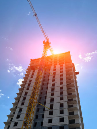 New house for many families, babies and new life, building multi storey building as a symbol of hope to better life. vertical photoの写真素材