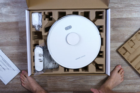 Tyumen, Russia-June 25, 2023: Smart Robot Vacuum CHOICE Honor Robot Cleaner R2. Selective focusのeditorial素材