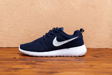 Tyumen, Russia-August 03, 2023: Blue Nike sneakers. Mens fashion, sport shoe, sneakers lifestyle concept streetwearのeditorial素材