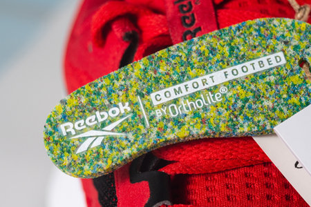 Tyumen, Russia-August 03, 2023: Modern red Reebok sneakers. Nanoflex TR V2.