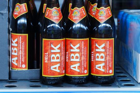 Tyumen, Russia-March 02, 2024: ABK lager beer bottles close up supermarket shelf. Selective focusのeditorial素材