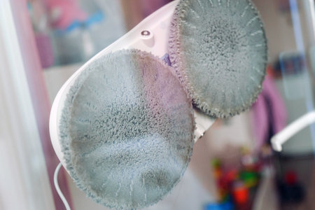 Cleaning robot washing the outside glass of window with beautiful view of sky.の写真素材