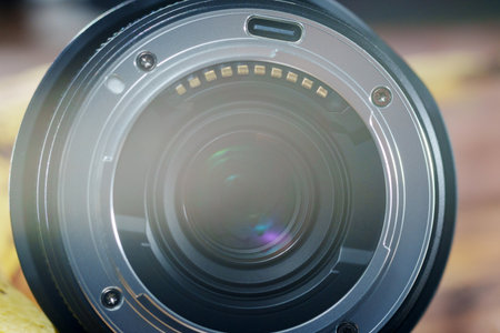 Close-up view of camera lens mount highlighting precise metal work and detail in well-lit environmentの写真素材