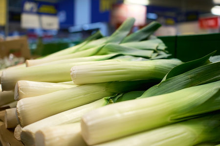 Fresh leeks on display at a local market during the afternoon hours
