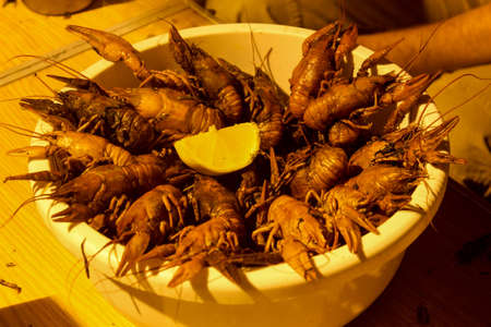 boiled crawfish on the table in the bowl of night