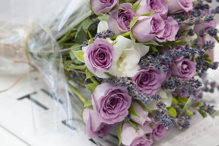 Composition of flowers delicate pink roses and white liliesの写真素材