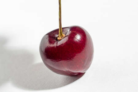 bright juicy ripe cherry berry isolated on a white background. Selective focus