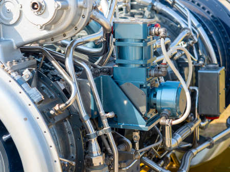 Close-up of the new engine for the ship. Mechanism with a bunch of pipes and partsの写真素材