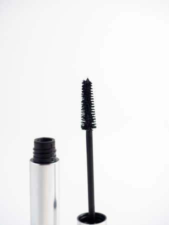 Open mascara isolated on a white background. Cosmetics for women. Brush for applying mascaraの写真素材