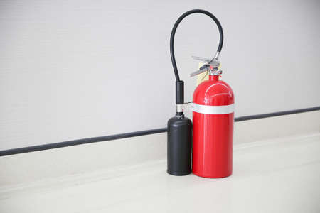 Stock Photo - portable fire extinguisher tank for any safety accidentの写真素材
