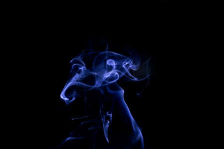 Blue Smoke on black background for art design or pattern.,Line abstract background., Smoke incense.,の写真素材