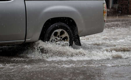 Drive through the flood., When it rains.