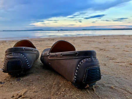 shoes On the beach at evening time.