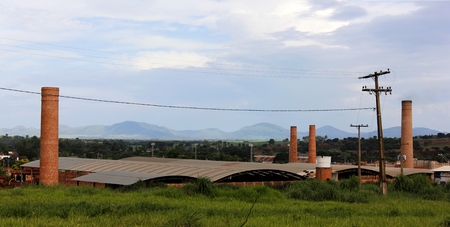 Brick factory in the countryside with landscape in the background.の写真素材