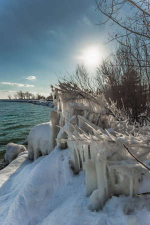 Ice and snow by Lake Ontario in Toronto.の写真素材