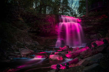 Great Falls aka Smokey Hallow aka Waterdown Falls, illuminated by a local charity group.の写真素材