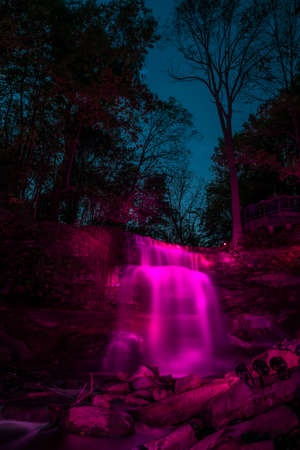 Great Falls aka Smokey Hallow aka Waterdown Falls, illuminated by a local charity group.の写真素材