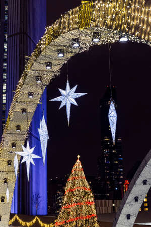 Toroto City Hall, illuminated in purple and decorated for the Christmas season.の写真素材