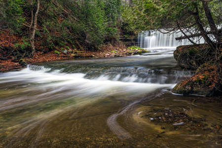 Beautiful and well hidden Cannings Falls in fall.の写真素材