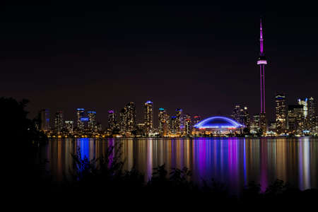 The Toronto skyline at night, from Centre Island in Toronto.のeditorial素材