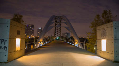Humber Bay Arch Bridge with downtown Toronto seen in distance.のeditorial素材
