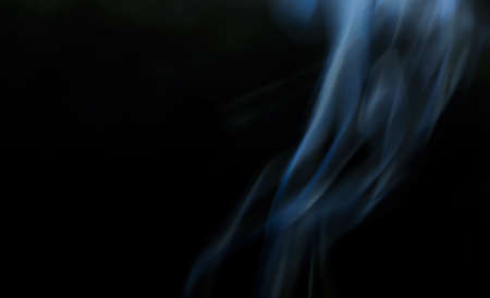 Blur focusing abstract of smoke, isolated on black backgroundの写真素材