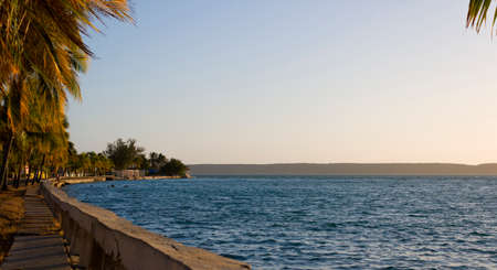 bay in the caribbean sea with beautiful sunsets and vibrant colorsの写真素材