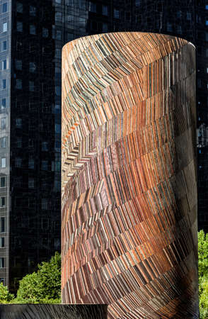 PARIS, FRANCE - August 20, 2016: La Defense, Vive Le Vent, The wind. Mosaic by Michel Deverne 1986.  Cylinder mosaic in front of dark skyscraperのeditorial素材