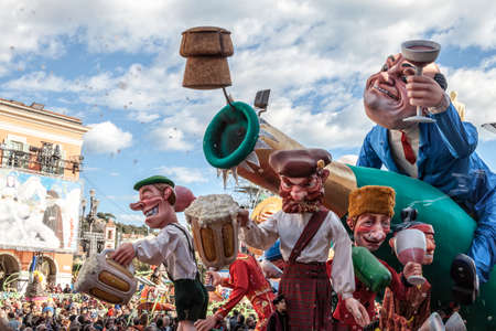 NICE - FRANCE - March 03, 2014: King of carnival 2014. The theme of Nice carnival is the gastronomy. Float dedicated to champagne and beerのeditorial素材