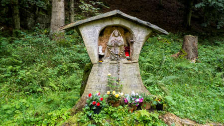 Little wooden altar in the woodsの写真素材