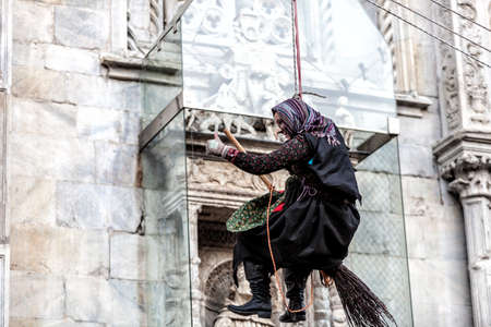 COMO, ITALY - January 6, 2017: during Epiphany an old woman flies bringing sweets to good children and coal to bad ones.  Como Lake
のeditorial素材