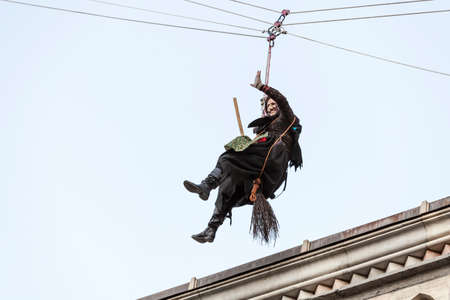 COMO, ITALY - January 6, 2017: during Epiphany an old woman flies bringing sweets to good children and coal to bad ones. Como Lake
のeditorial素材