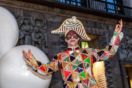 MILAN - ITALY - March 02, 2017: A company of acrobats actors inaugurate the Milan Carnival. Duomo Cathedral square, Milan, Lombardy, Italyのeditorial素材
