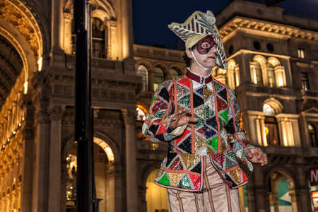 MILAN - ITALY - March 02, 2017: A company of acrobats actors inaugurate the Milan Carnival. Duomo Cathedral square, Milan, Lombardy, Italyのeditorial素材