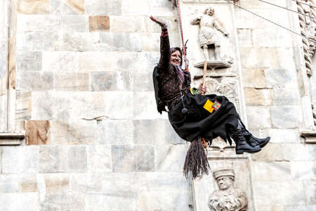 COMO, ITALY - January 6, 2017: during Epiphany an old woman flies bringing sweets to good children and coal to bad ones.  Como Lake
のeditorial素材