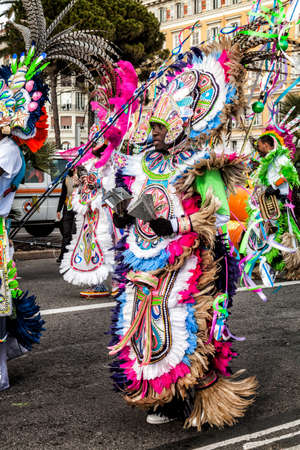 NICE - FRANCE - March 01, 2014: Carnival of Nice, Flowers' battle. Parade of traditional costumes of Polynesiaのeditorial素材