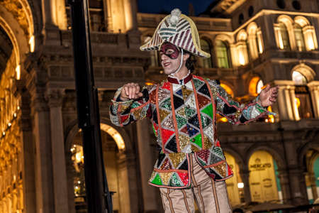MILAN - ITALY - March 02, 2017: A company of acrobats actors inaugurate the Milan Carnival. Duomo Cathedral square, Milan, Lombardy, Italyのeditorial素材