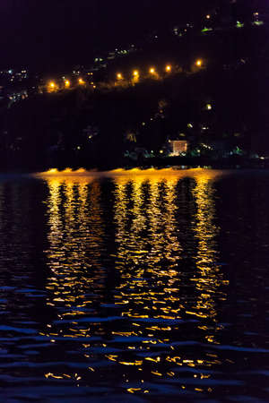 Nightscape view of the lake. Como. Como Lake, Italyの写真素材