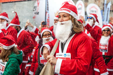 COMO, ITALY - December 10, 2016: Runners taking part in the Babbo Running, annual event to support  Smile Factory and his projects  for the prevention and treatment of childhood cancersのeditorial素材