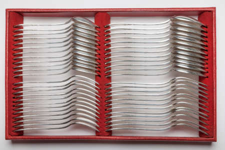Vintage silverware red box isolated on white background, circa 1920
の写真素材