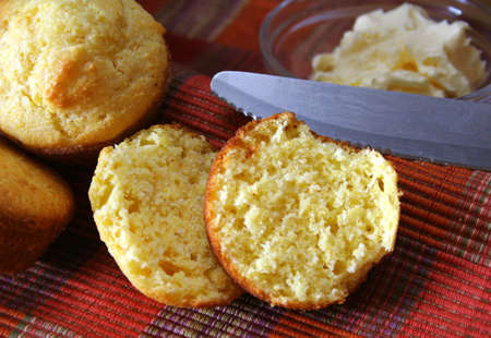 corn bread muffins with knife and butter in the background.



corn bread muffins with knife and...