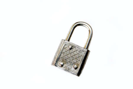 a small lock isolated on a white background.の写真素材